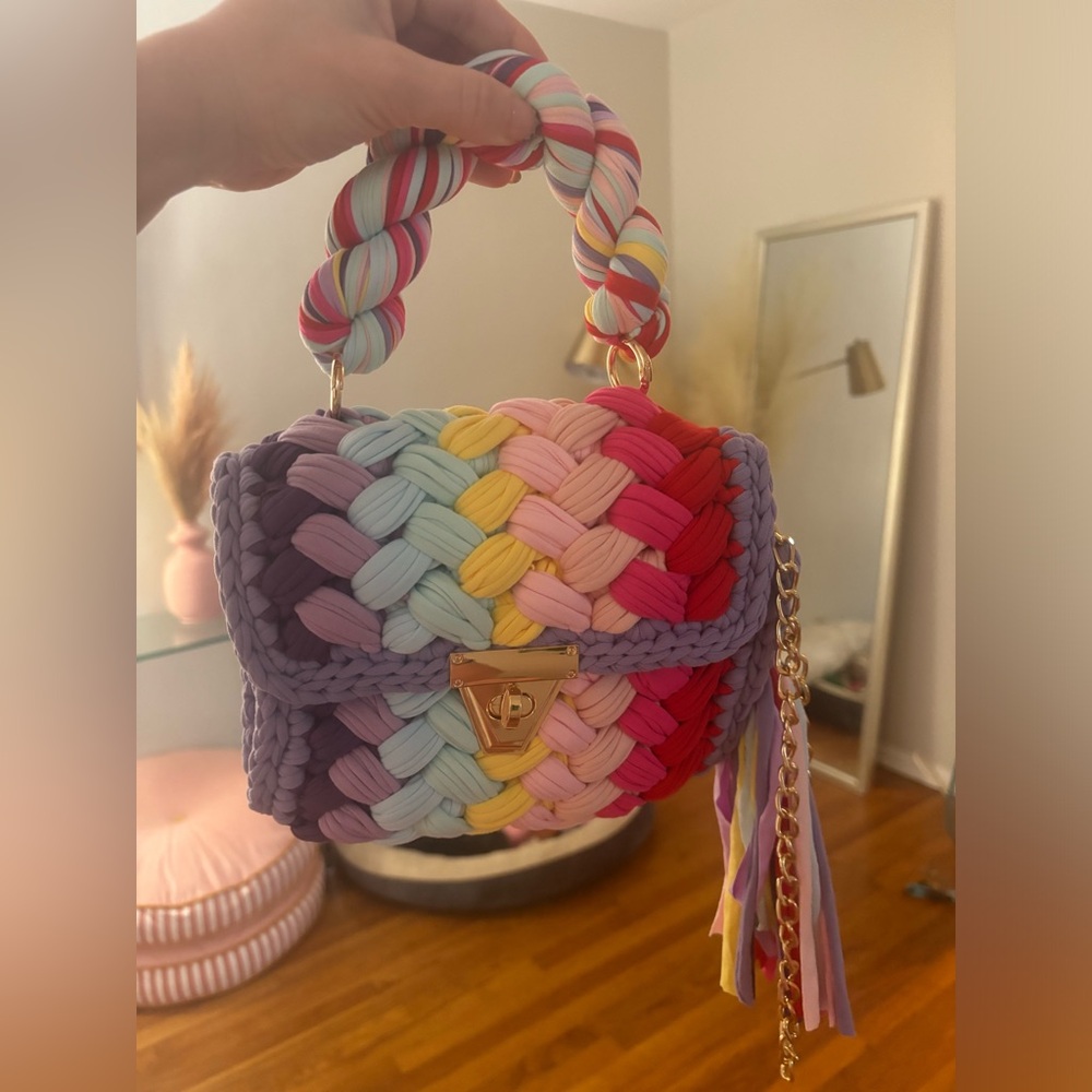 Vici woven rainbow purse.
